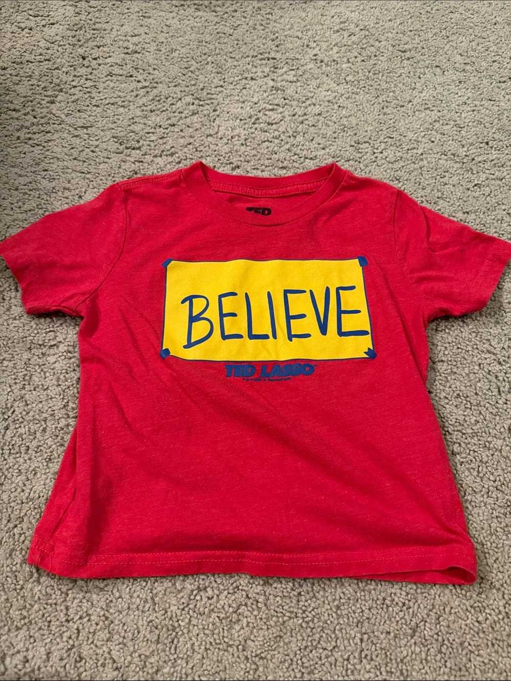 Kids' Red 'Believe' Graphic Tee by Ted Lasso